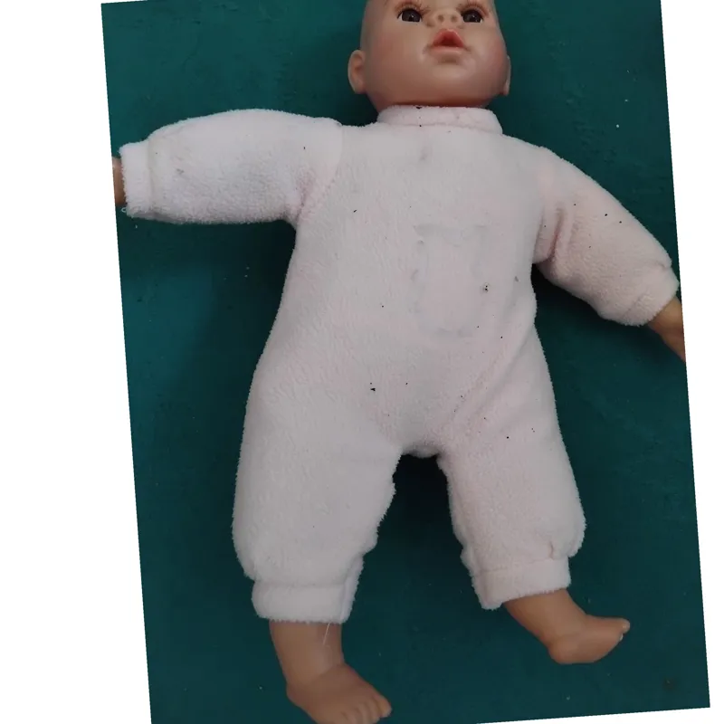 عروسک بچه کچل