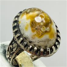 عین
