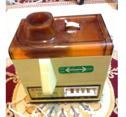 آبمیوه گیری ناسیونال ژاپنی با پارچ لرزش دارد