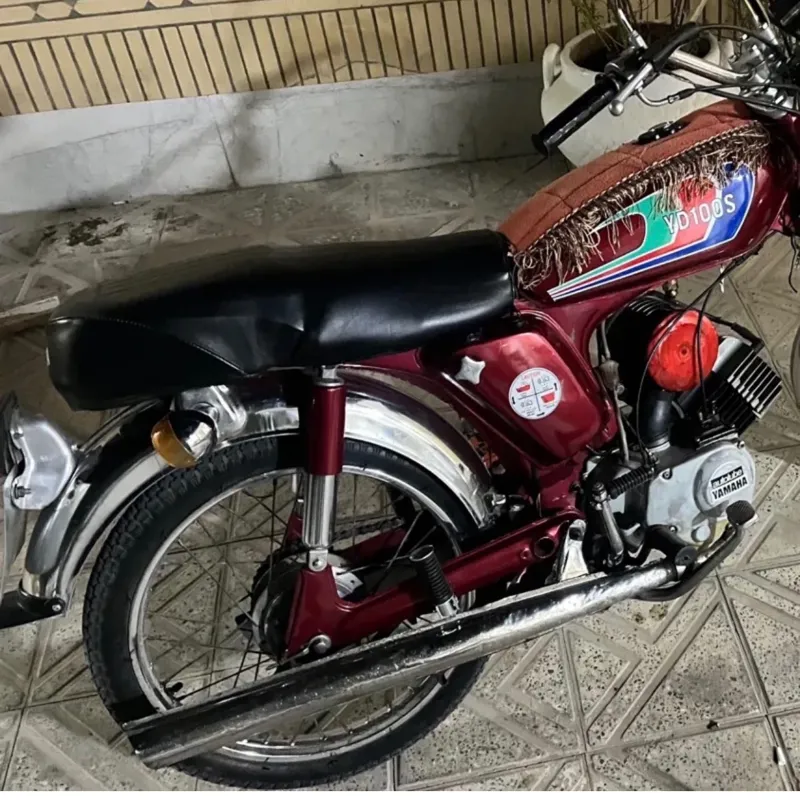 اگزوز و زین یاماها 100