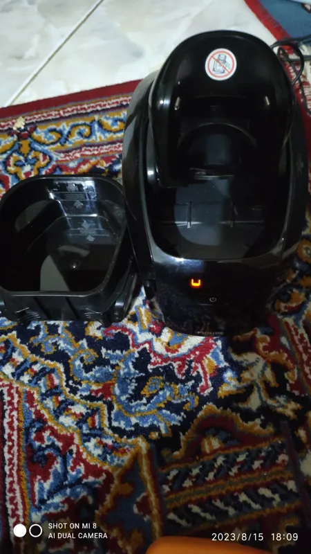 شارژر و شستشوی ریش تراش. فیلیپس Clean and charge 4