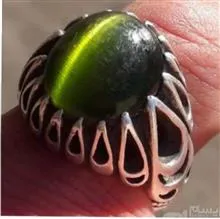 عین