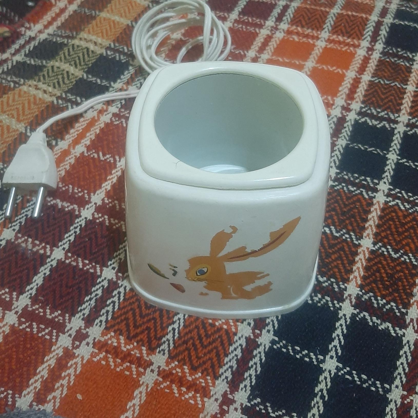 گرم کن شیشه شیر کودک