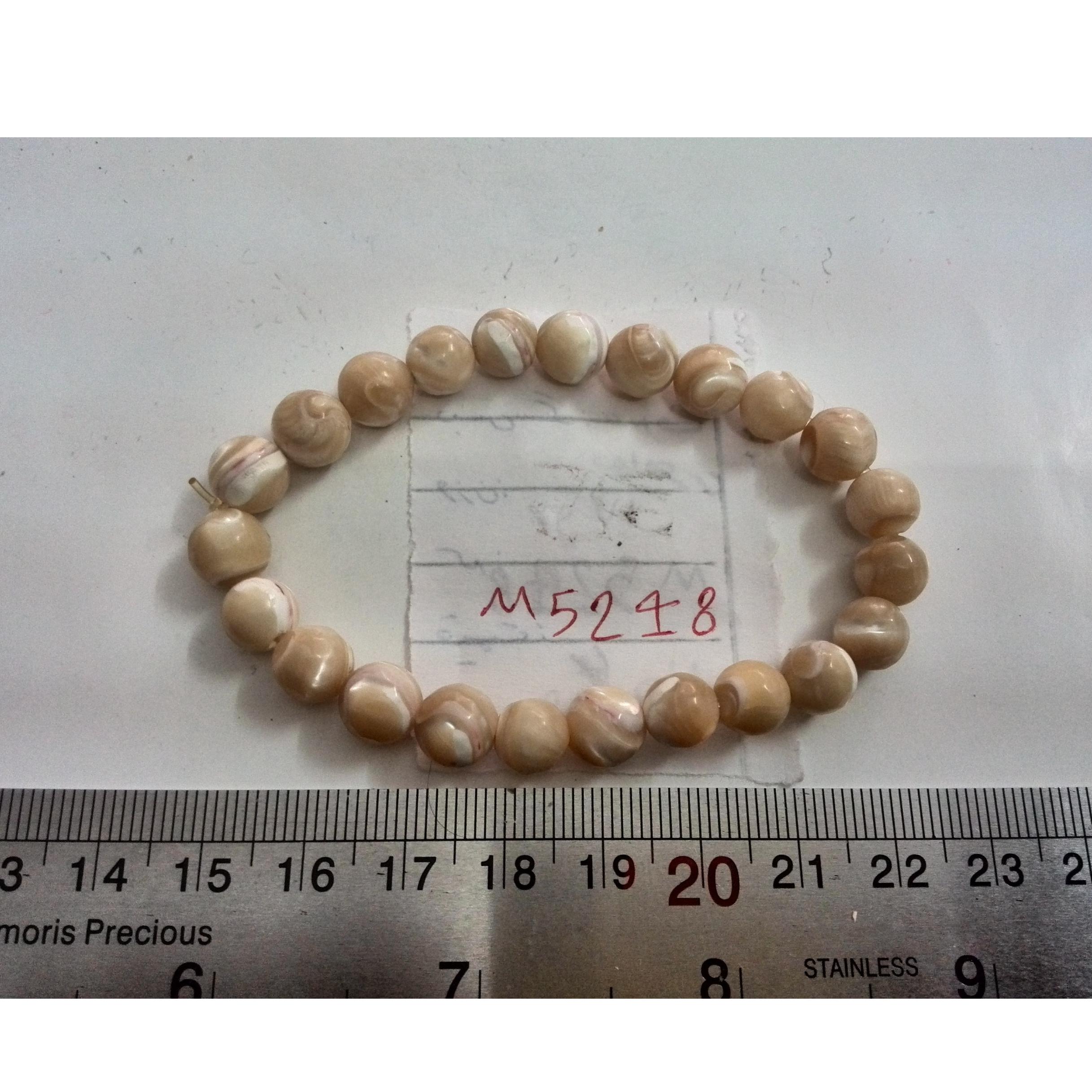 دستبند سنگ صدف کاراملی عالی(فروشگاه سیدمجرد)