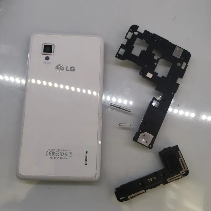 درب پشت و اسپیکرها گوشی الجی LG E975
