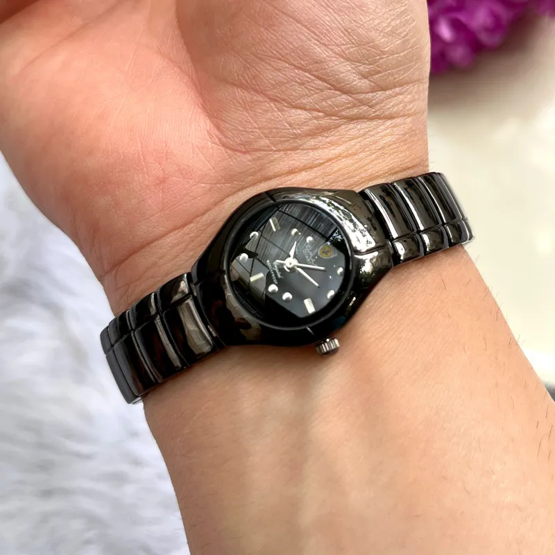 ساعت مچی زنانه تمام استیل ژاپنی فول مشکی Omax