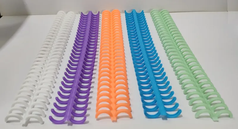 فنر کلاسوری پلاستیکی 12mm (بسته 10 تایی)