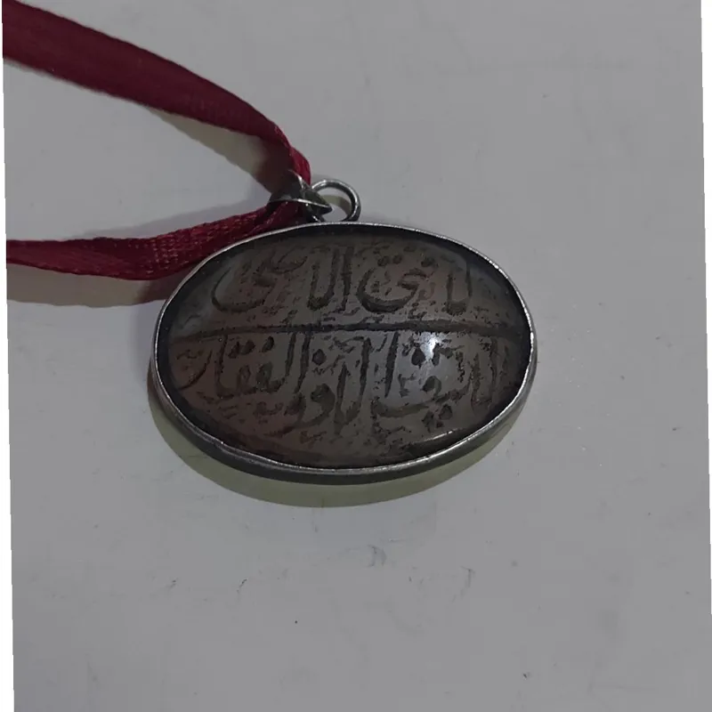 خط کهنه قلم روی عقیق