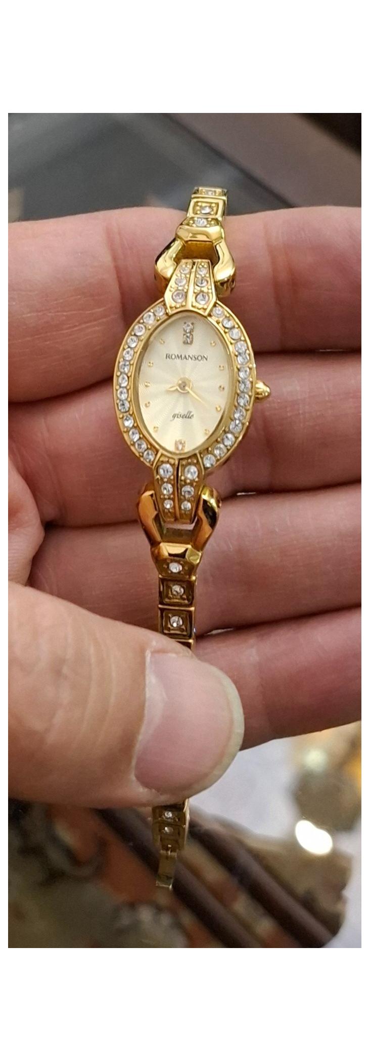 ساعت مچی زنانه طلایی رومانسون اصل سوئیس