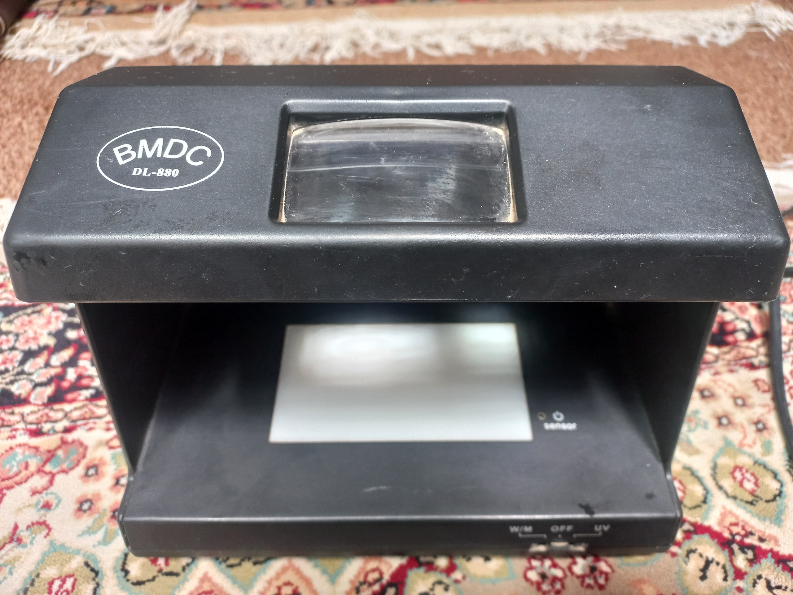 دستگاه تشخیص اسکناس جعلی