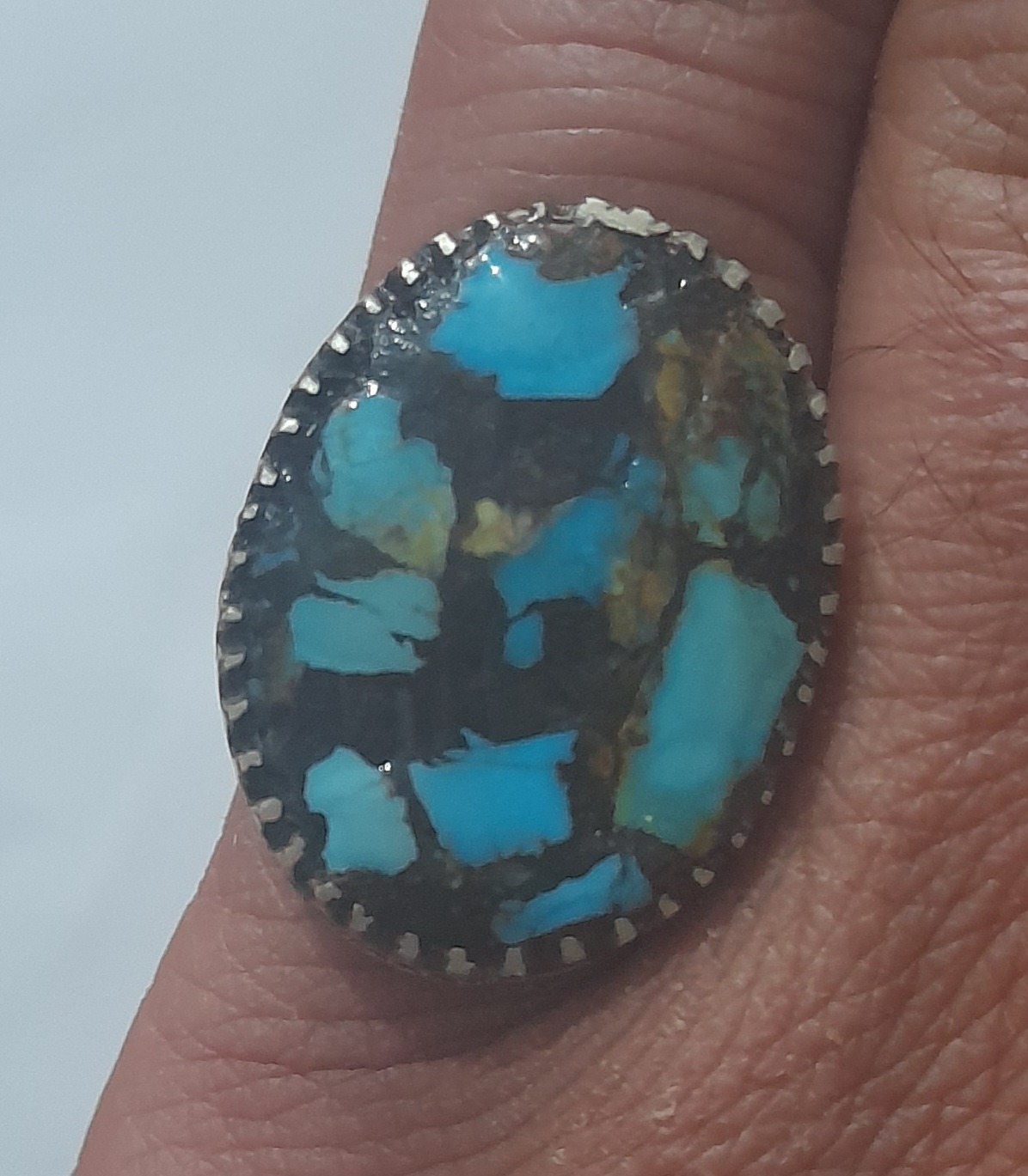 یک انگشتر نقره و سنگ فیروزه کوبی نیشابور