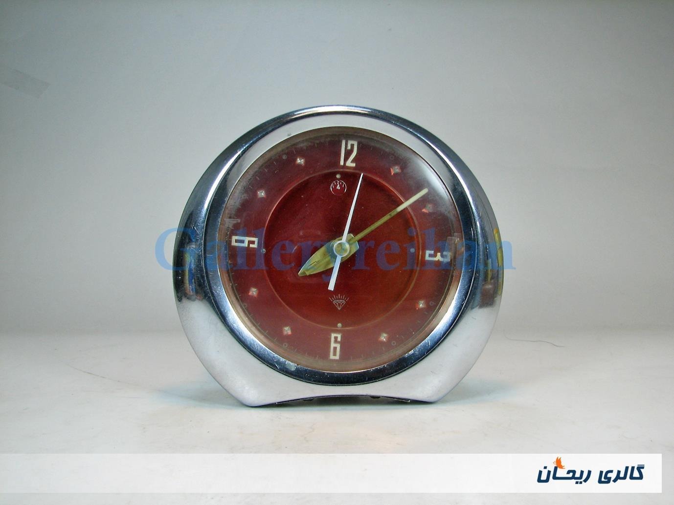ساعت رومیزی قدیمی کوکی رنگ استیل و قرمز (کد10145)