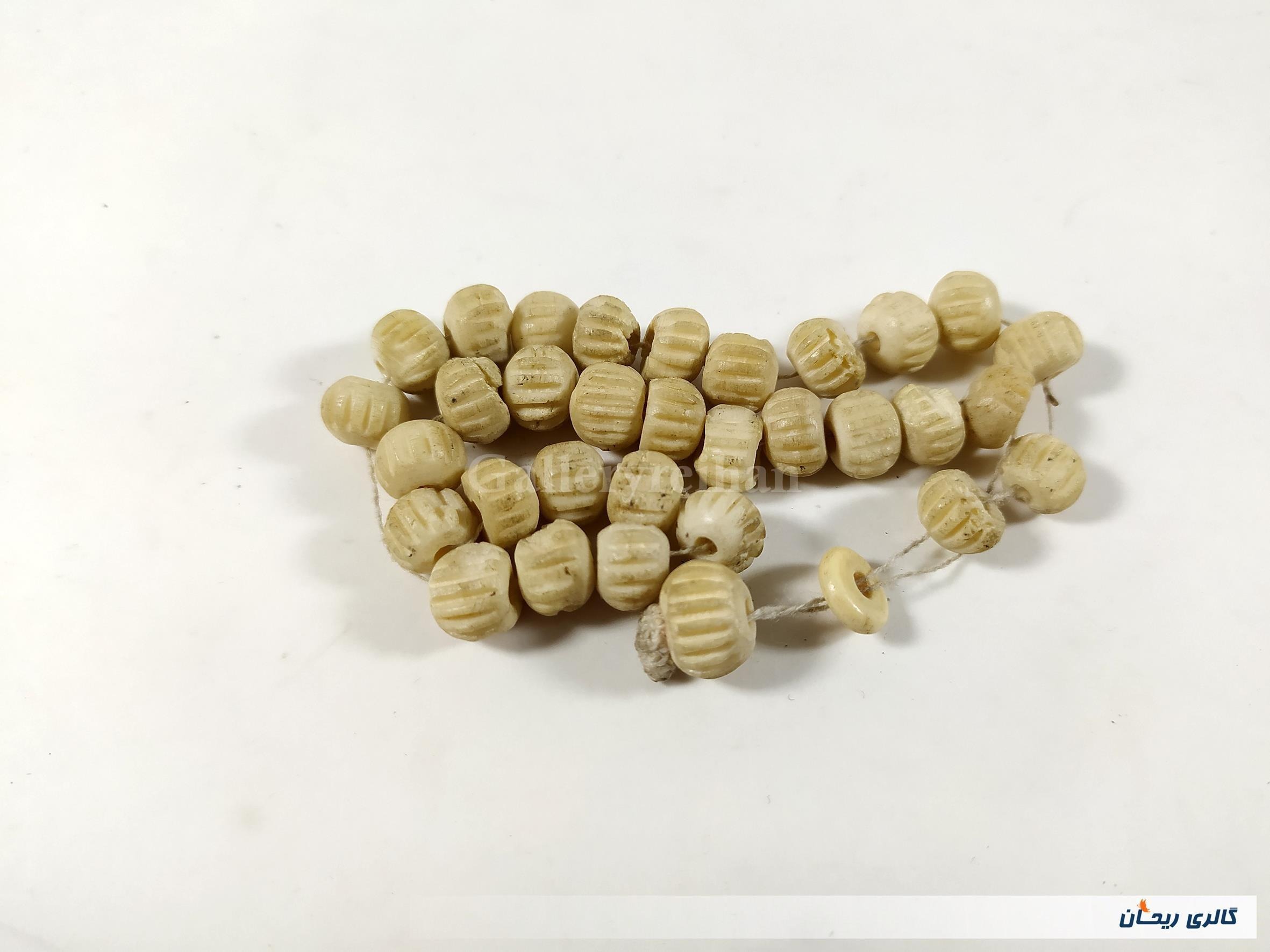 33 عدد مهره طرح دار ساخته شده از استخوان (25283)