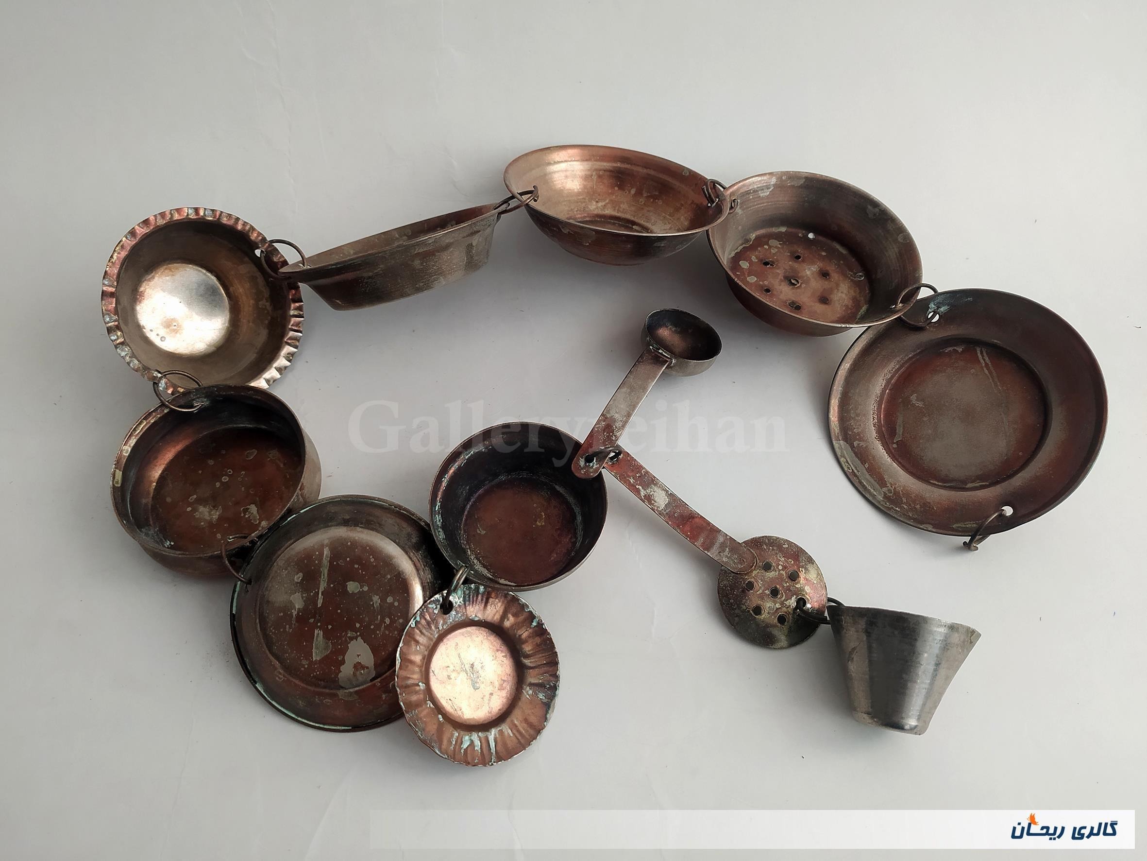 ست 12 تکه ظروف فانتزی آویزی طرح مسی (کد48939)