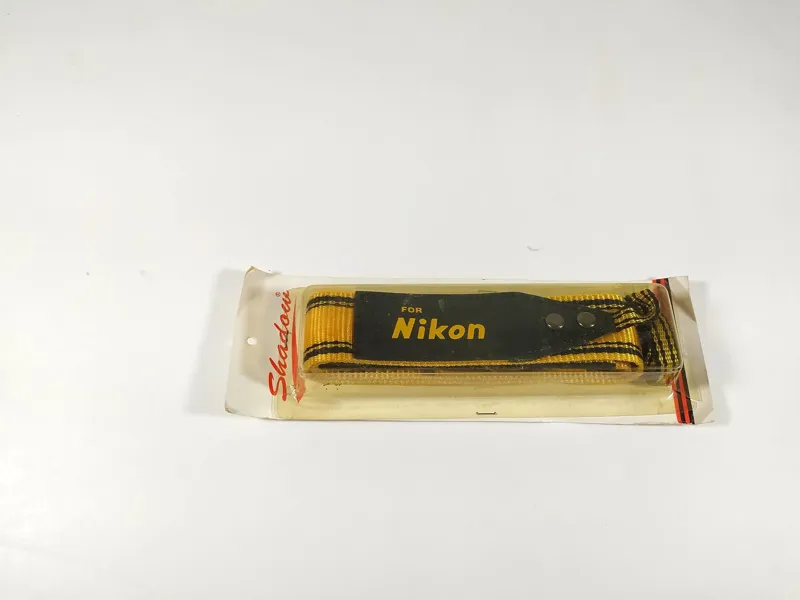 بند آکبند زرد دوربین عکاسی مارک Nikon (کد 25256)