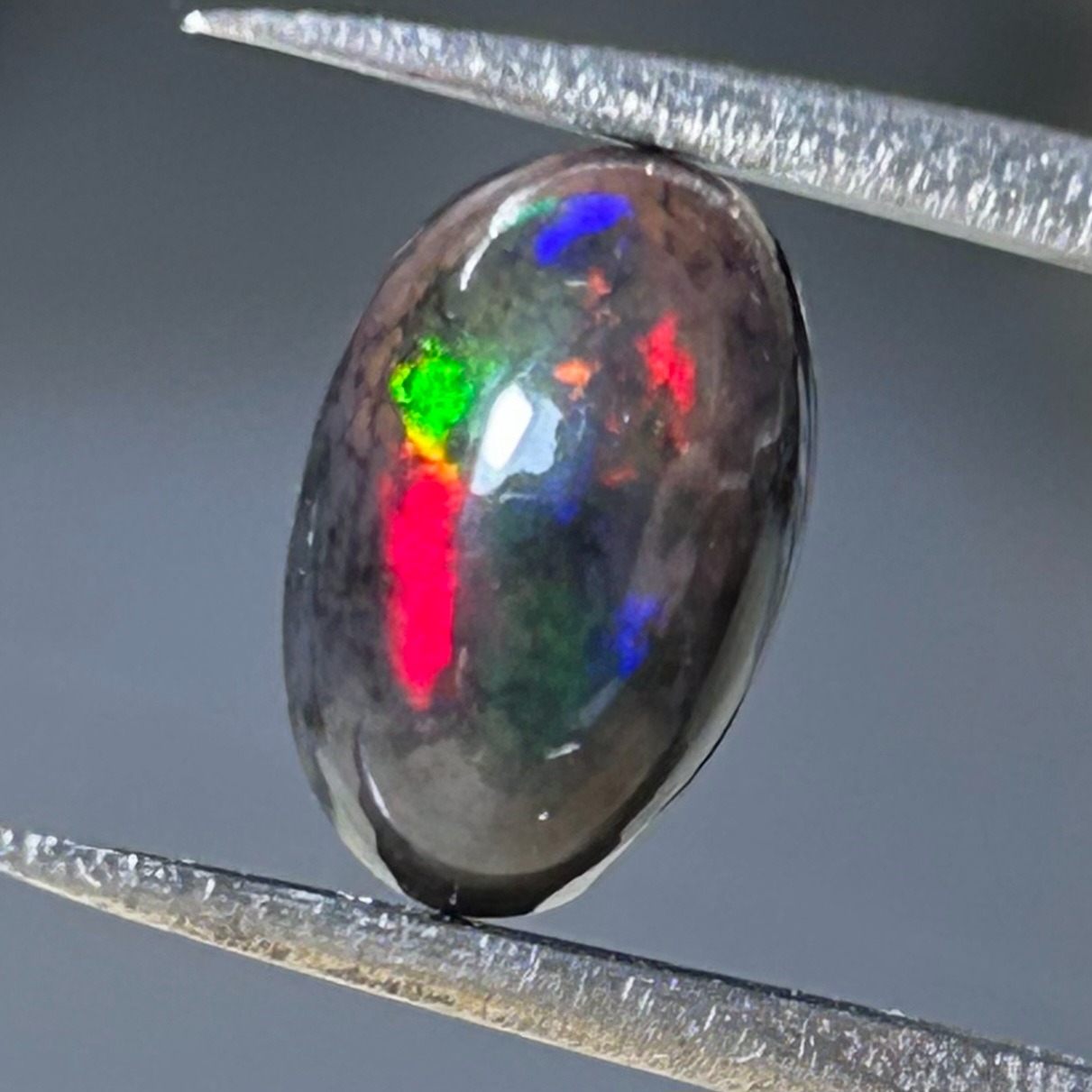 اوپال هفت رنگ اتیوپی بیضی 1 × 0.6 cm