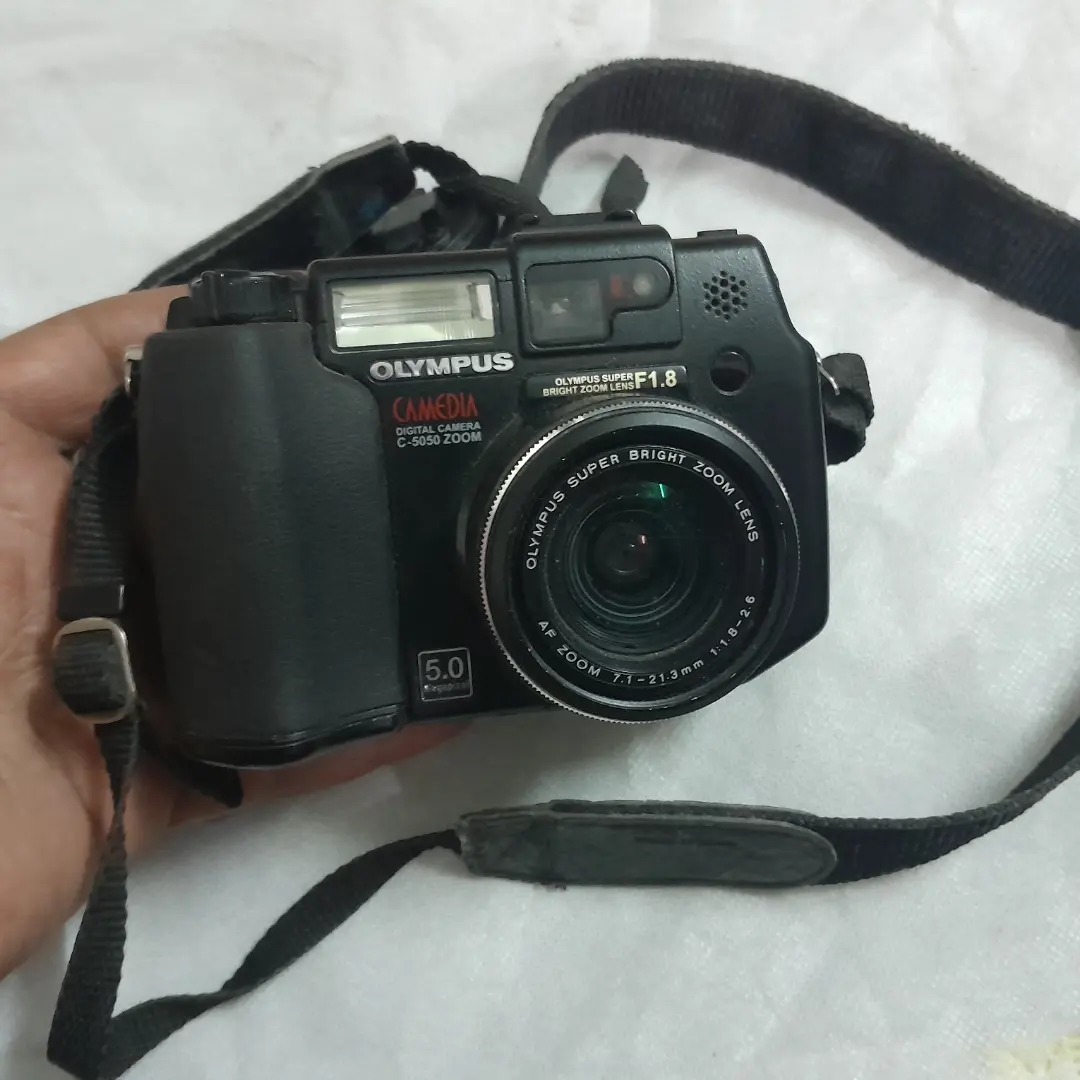 دوربین دیجیتال المپیوس کلکسیونی توضیح خوانده شود