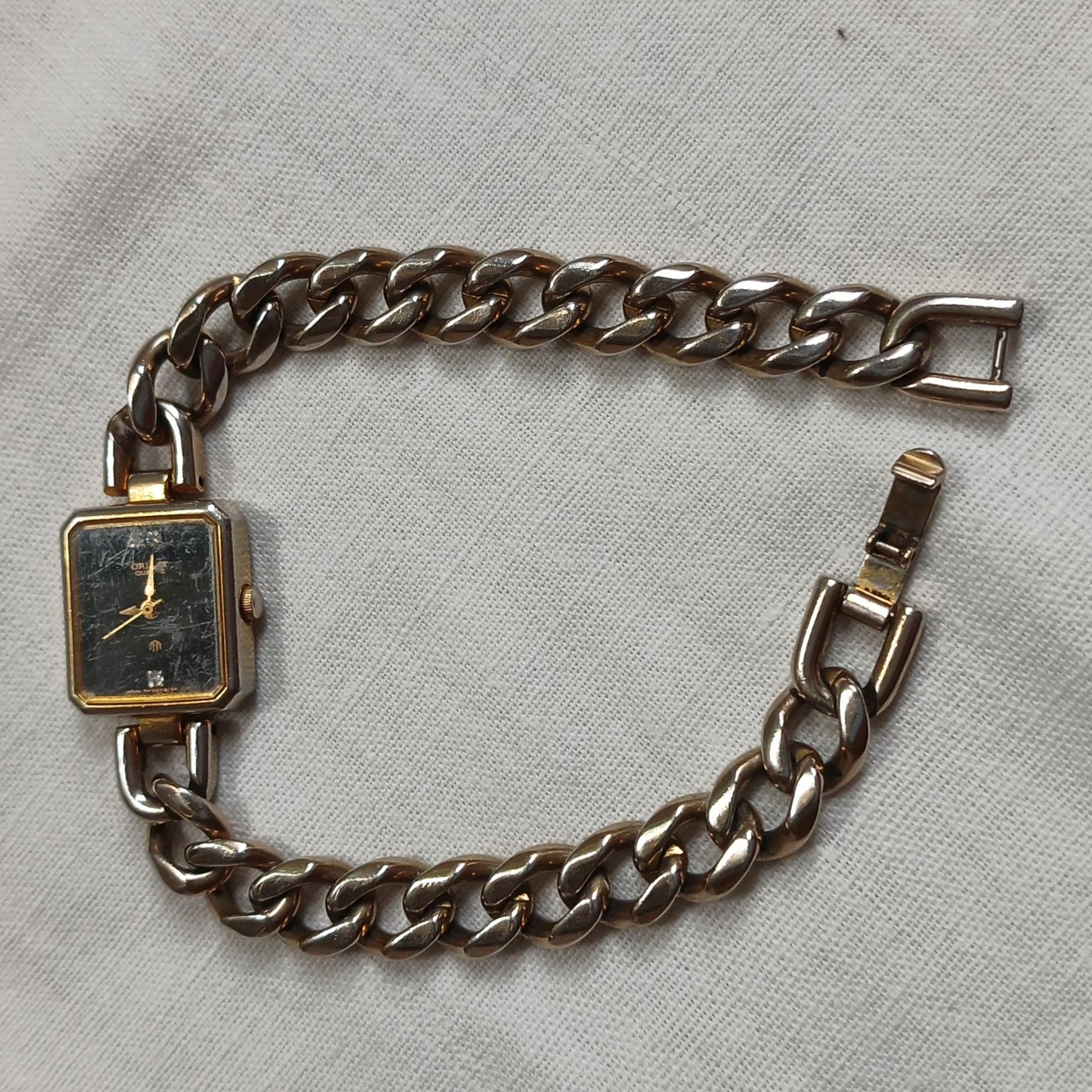 ساعت ORIENT QUARTZروکش طلای استیل ژاپن