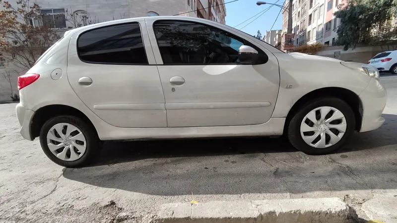 قالپاق پژو207 طرح اسپرت سایز رینگ 14 فابریک