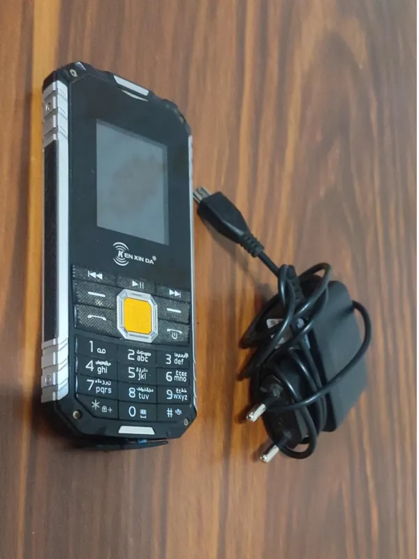گوشی Ken xin da دو سیم کارت مموری خور مدل R7700