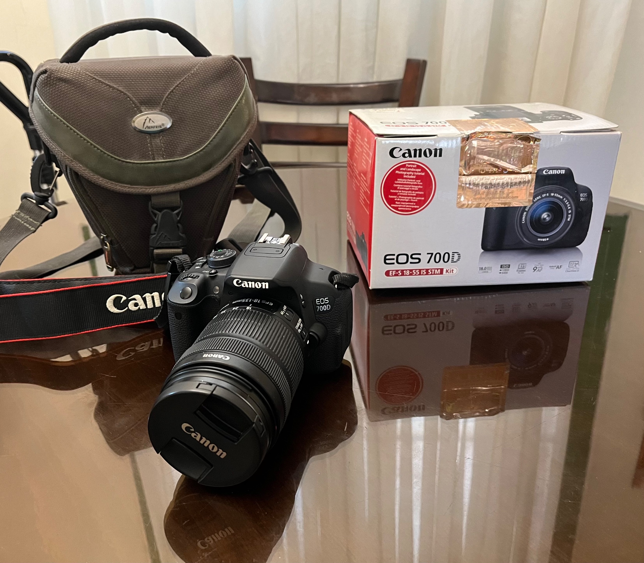 دوربین عکاسی کنون 700D با لنز 135-18 سالم و تمیز