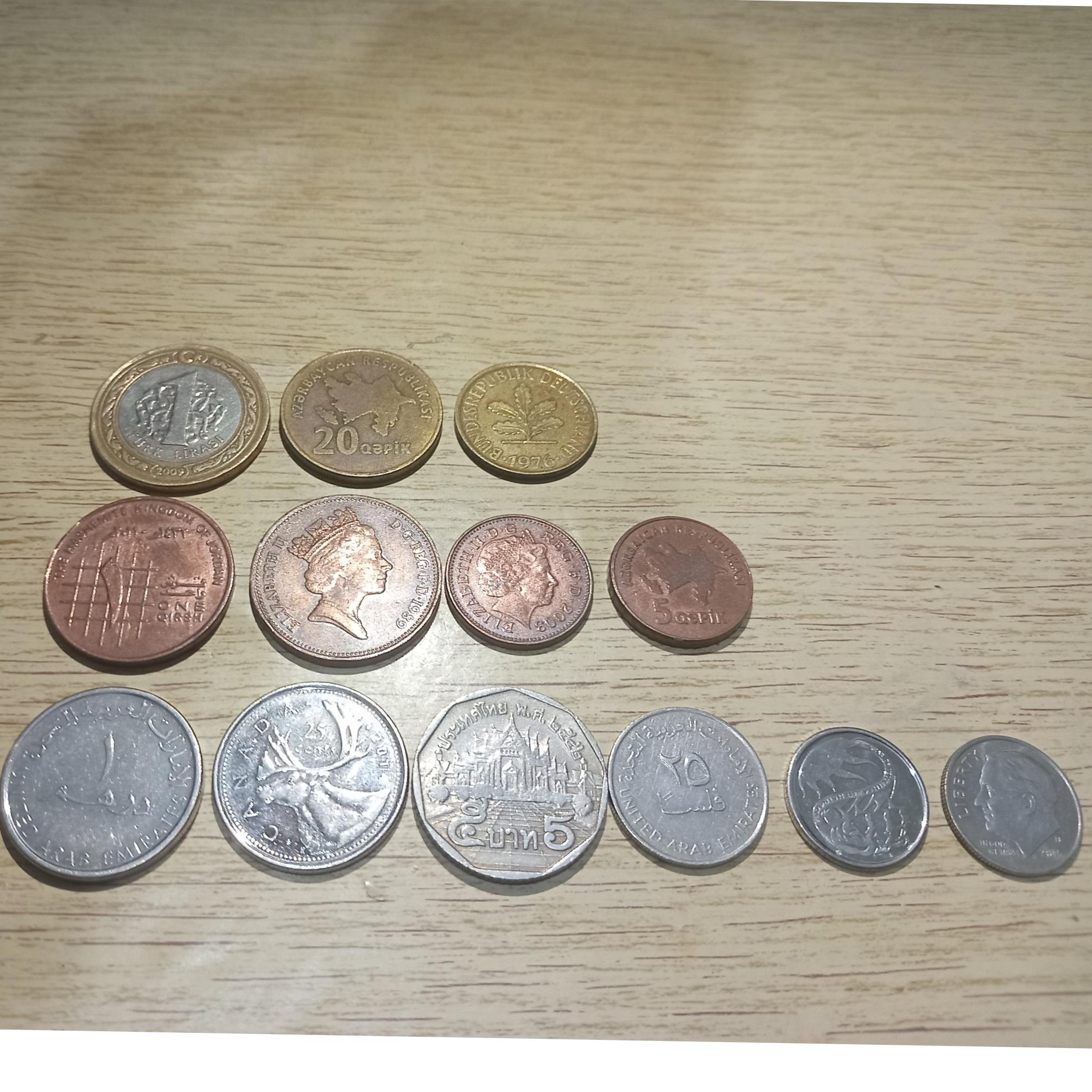 13 عدد سکه ارزشمند خارجی مختلف