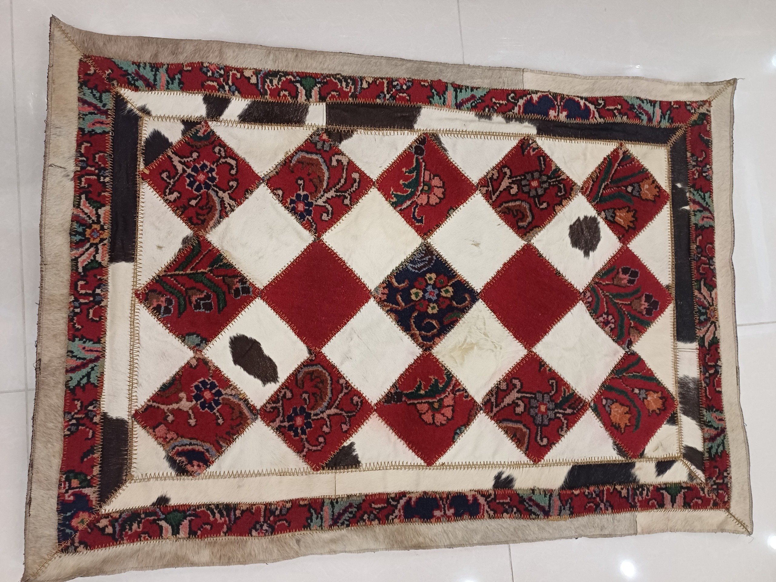 پوست و فرش دست دوز