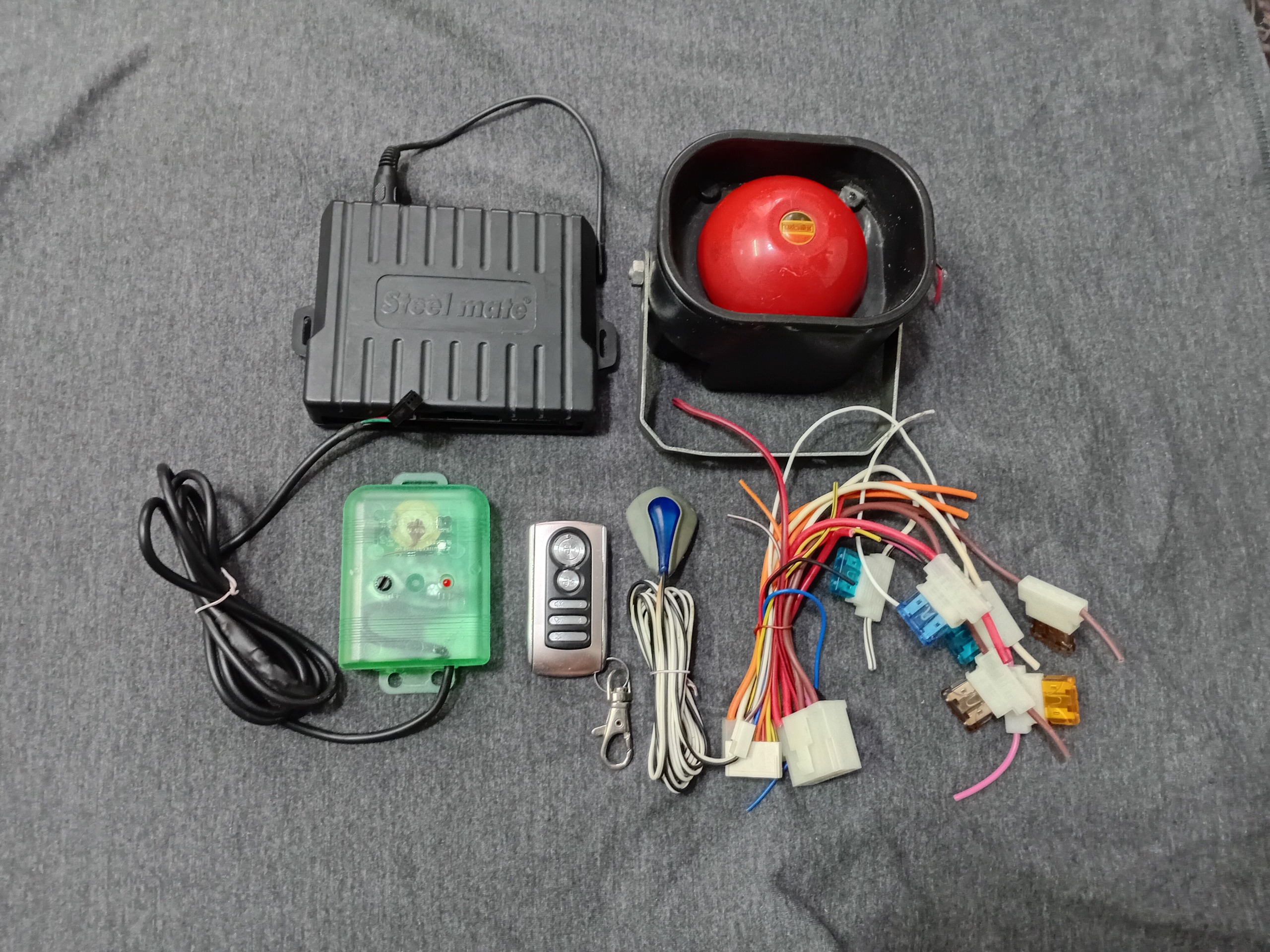 دزدگیر اورجینال  استیل میت با یک ریموت لوازم