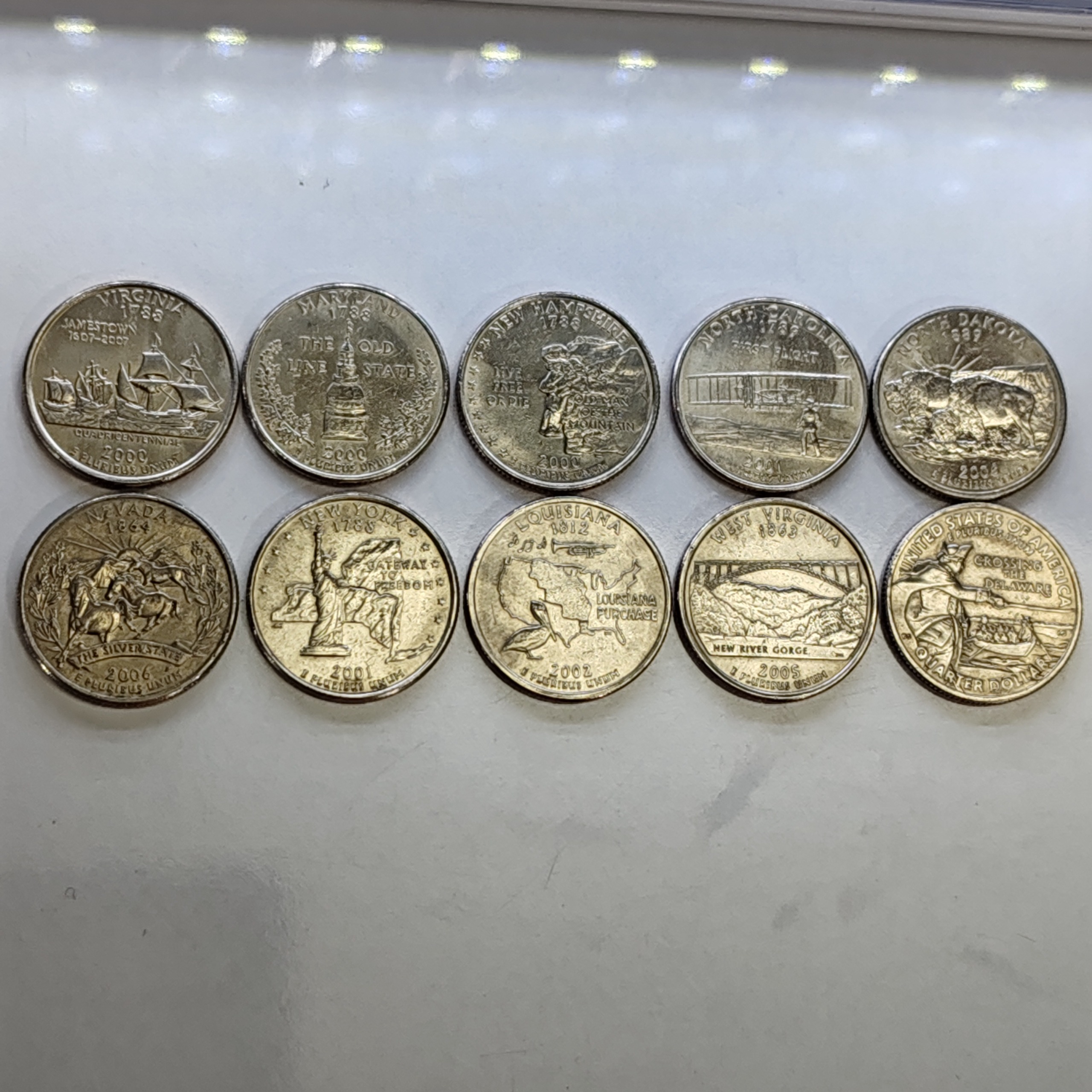 10عددسکه کوارترویادبودی10 ایالت مختلف آمریکا عالی