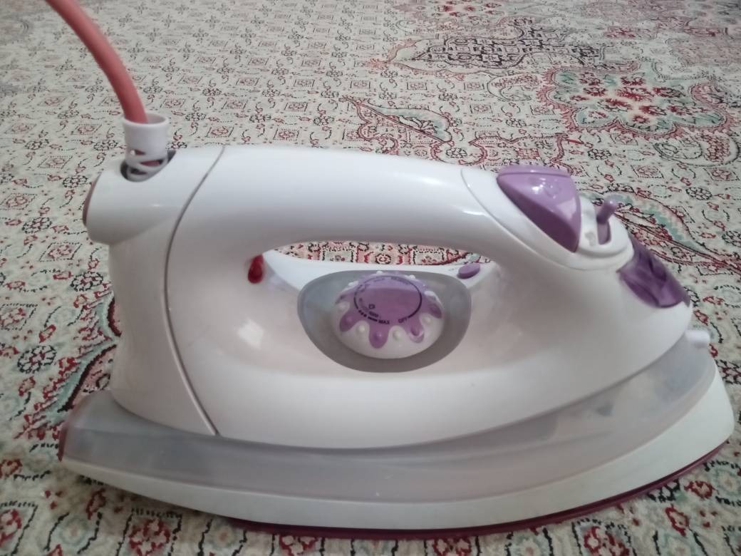 اتو بخار نانیوا