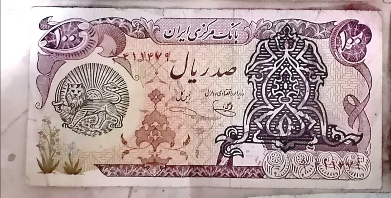 اسکناس 100ریالی سوروشارژ