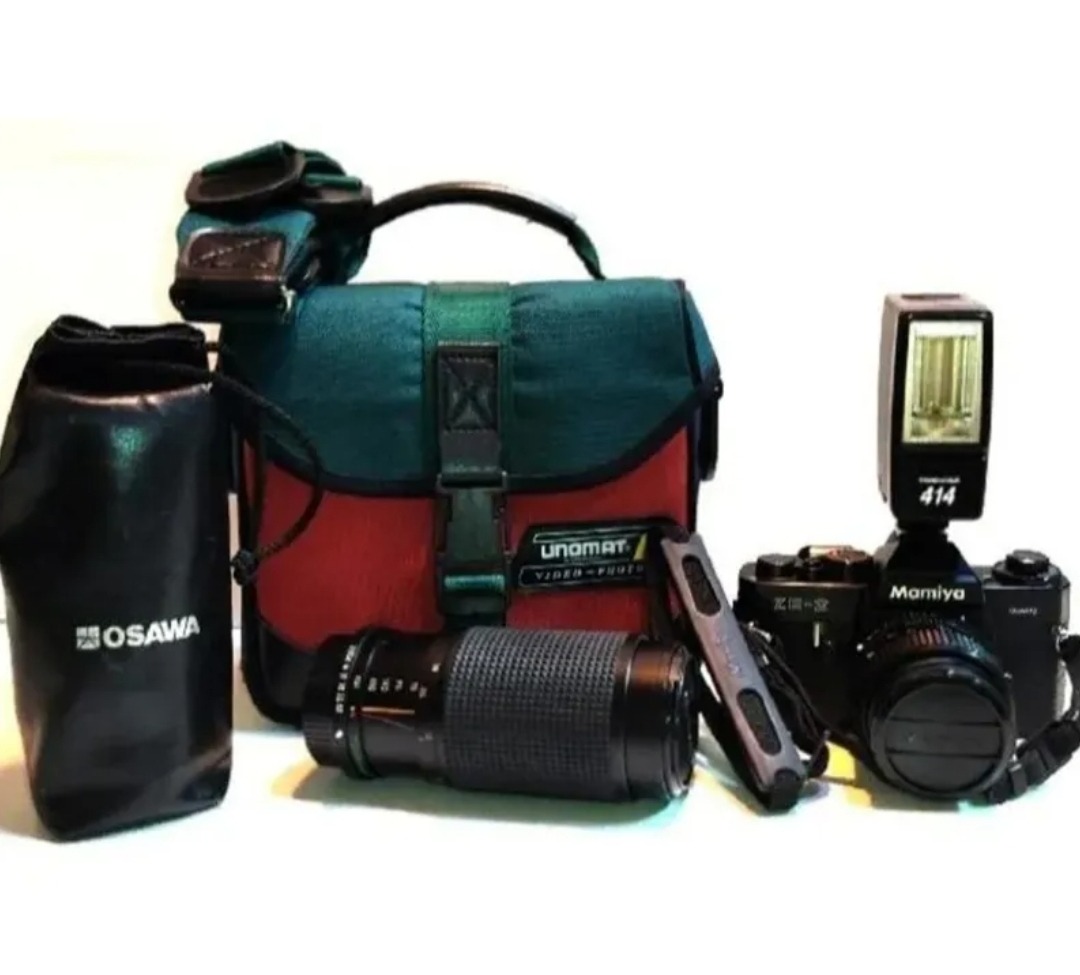 دوربین مامیادرحدنوبا لنز زوم و فلاش وکیف خارجی