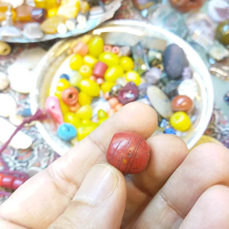 مهره سرباره کهنه مرجانی رنگ
