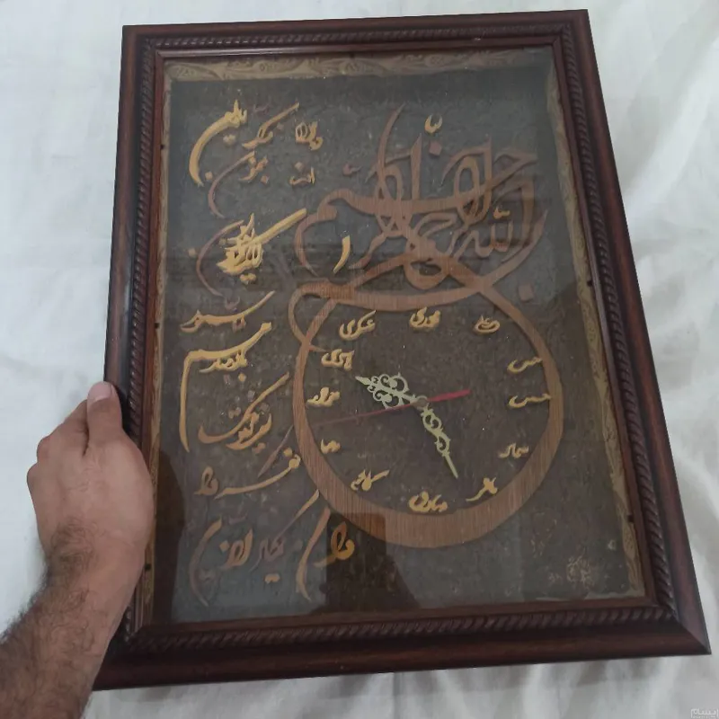 ساعت دیواری چوبی کار دست