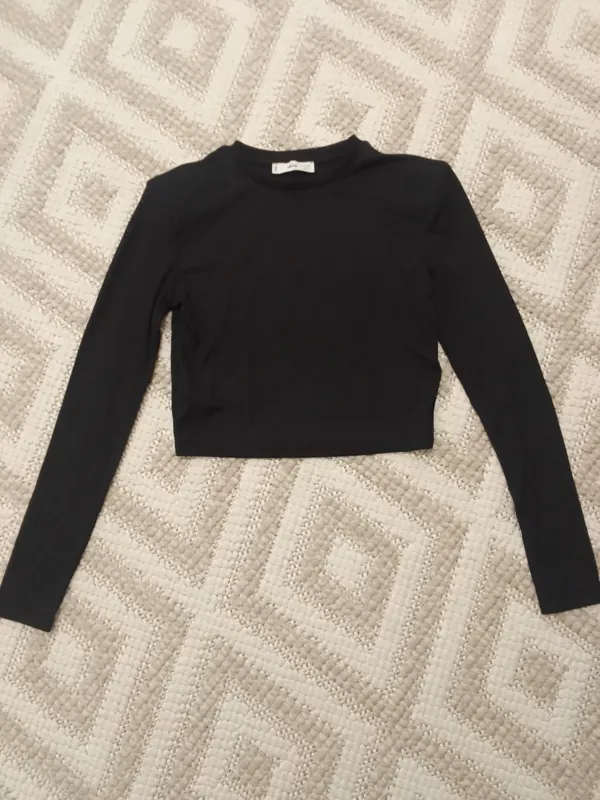 نیم تنه بلوز آستین بلند مشکی اپل دار منگو mango