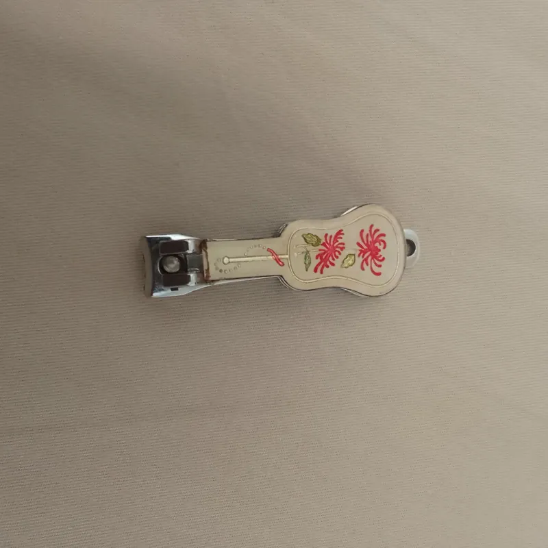 ناخنگیر کوچک کودک بزرگسال گلدار فانتزی قدیمی آنتیک