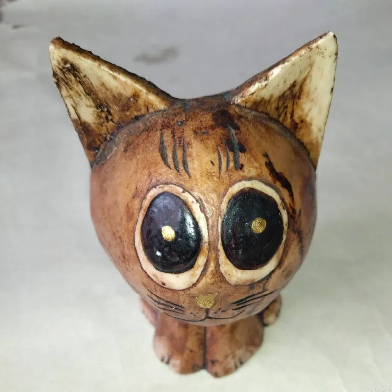 مجسمه گربه ملوس
