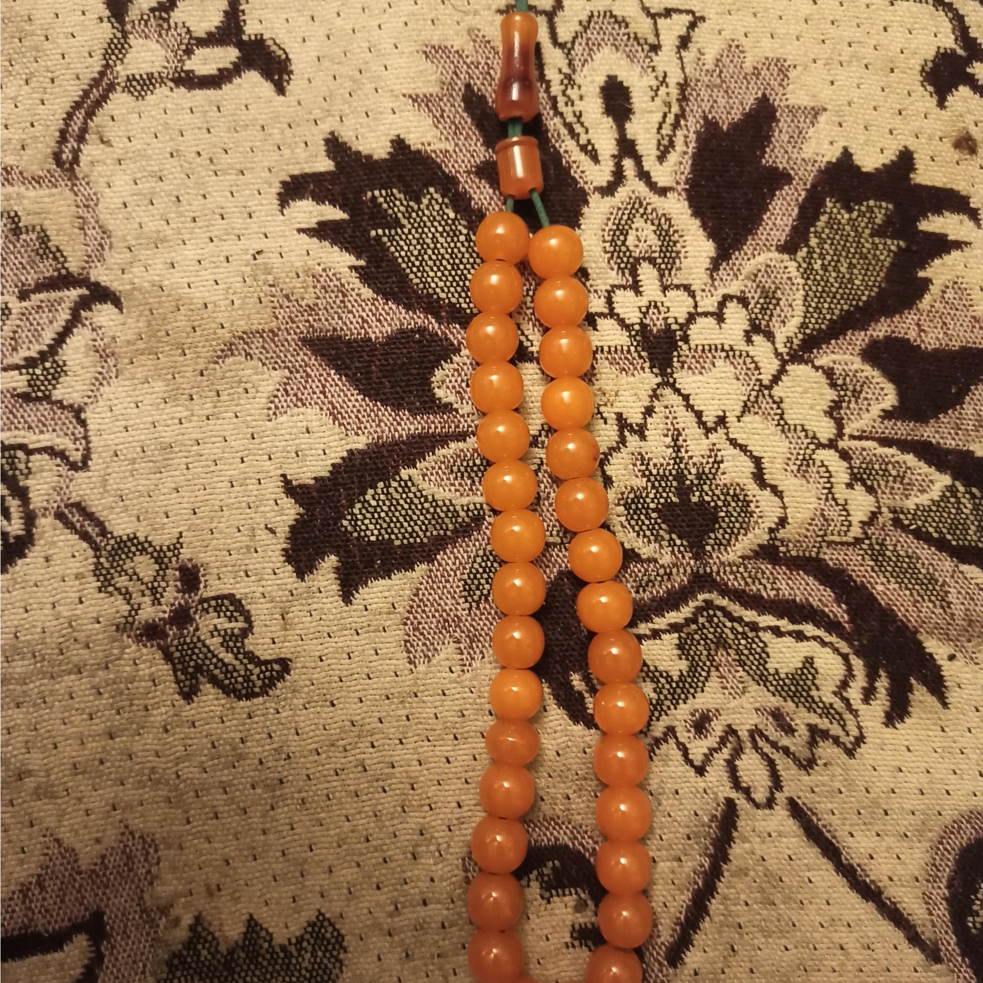 تسبیح سندلوس نارنجی رنگ