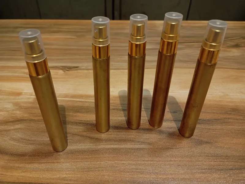 شیشه عطر جیبی با محفظه برنجی