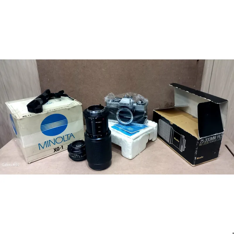 دوربین مینولتا XG1 با دوتا لنز آکبند