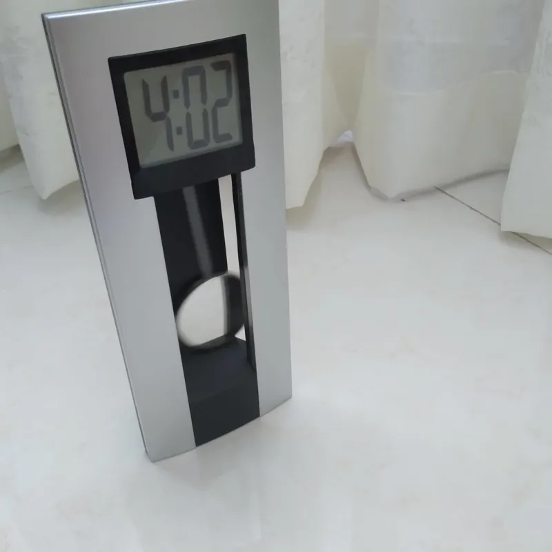 ساعت رومیزی دیجیتال پاندول دار