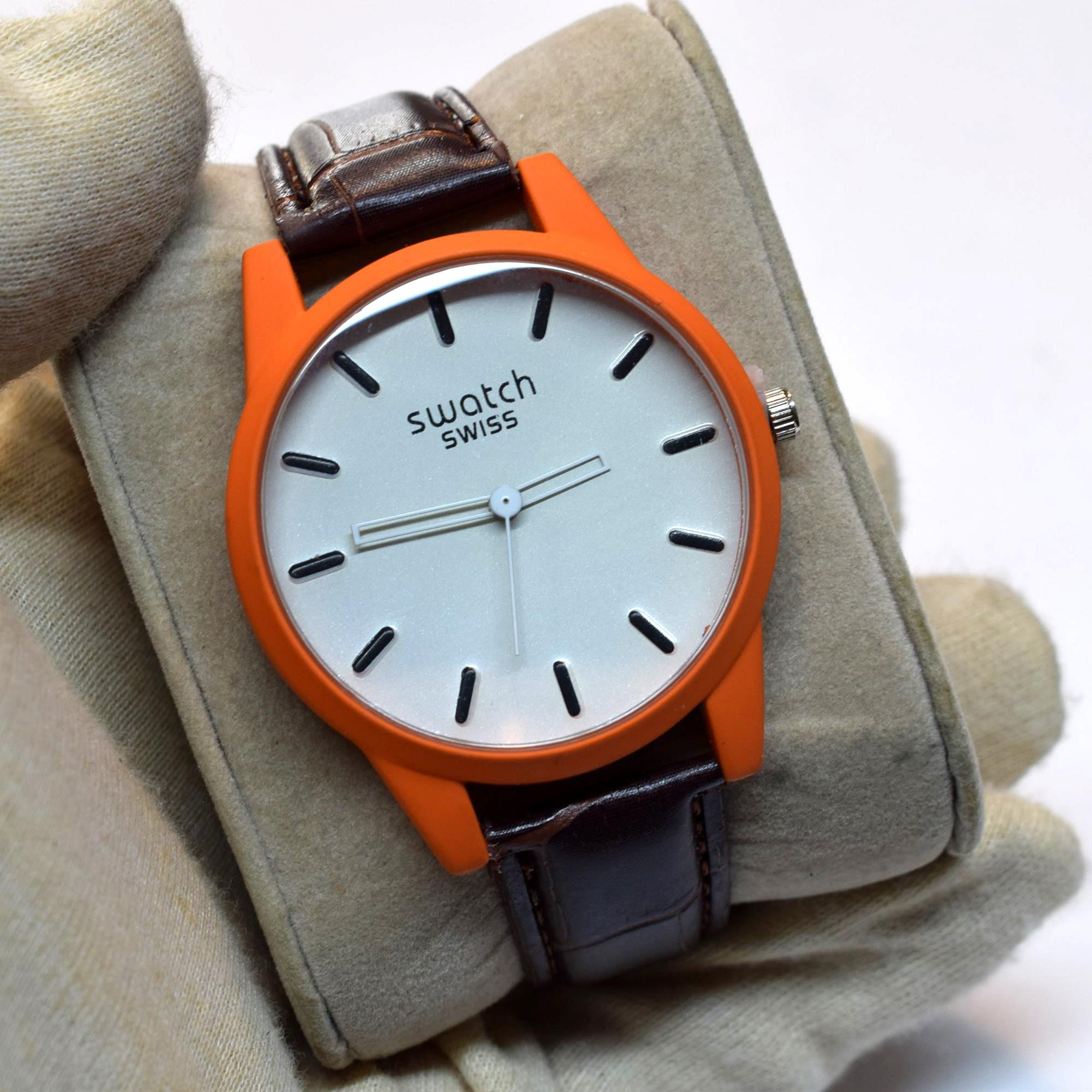 حراج بلک فرایدی ساعت Swatch بند چرمی نارنجی