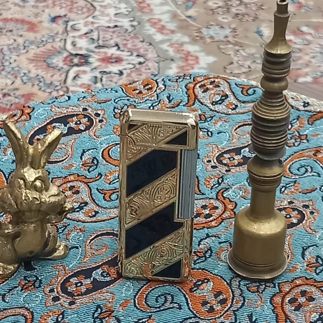 فندک گازی بعل زن با بدنه حکاکی