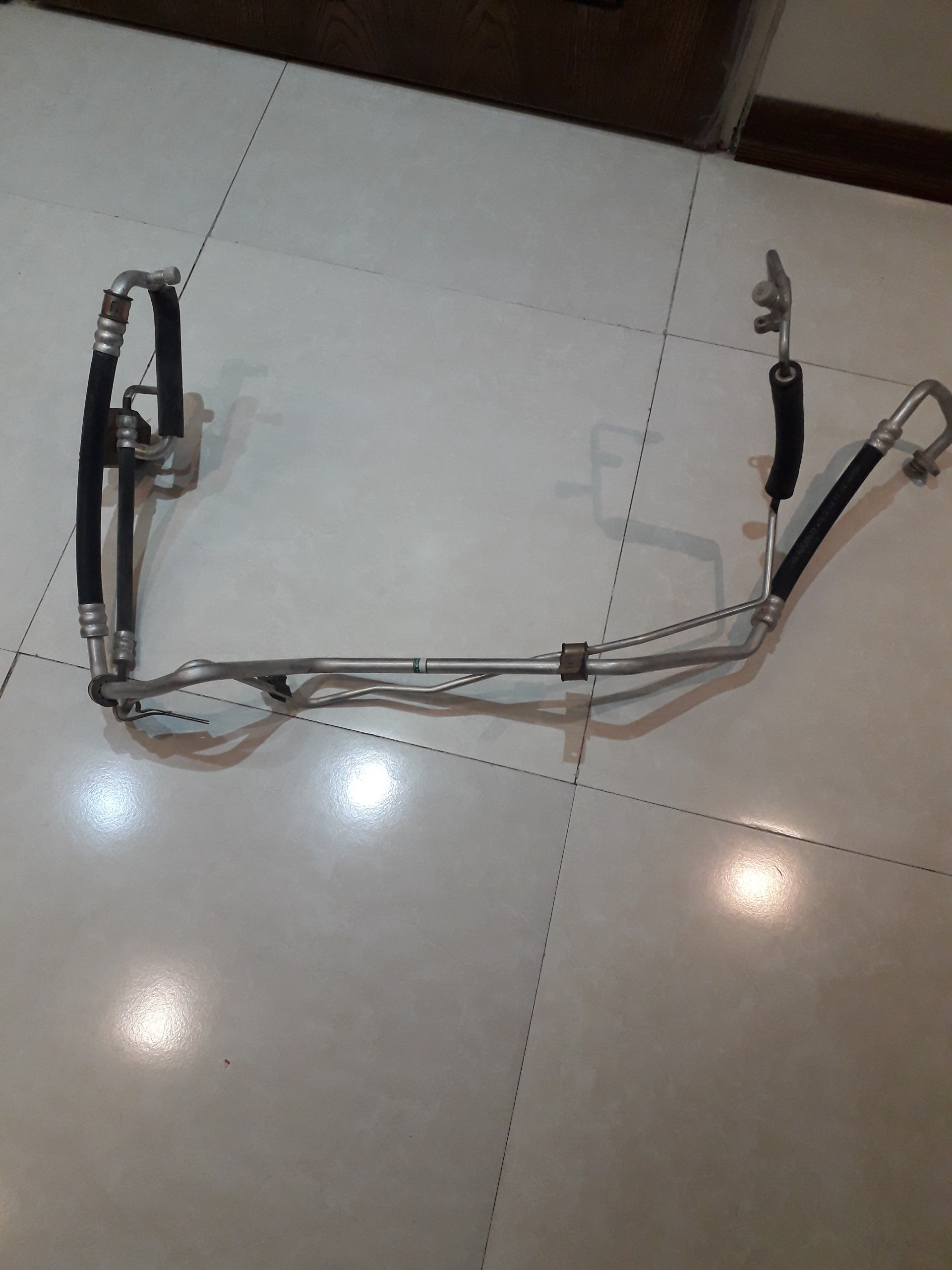 شیلنگ رفت و برگشت کولر پژو 206