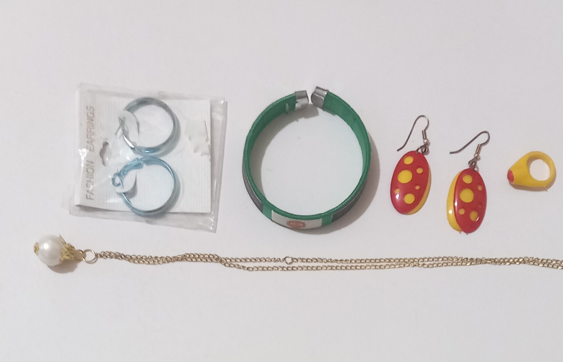 مجموعه گردن اویز،انگشتر،گوشواره ومچبند