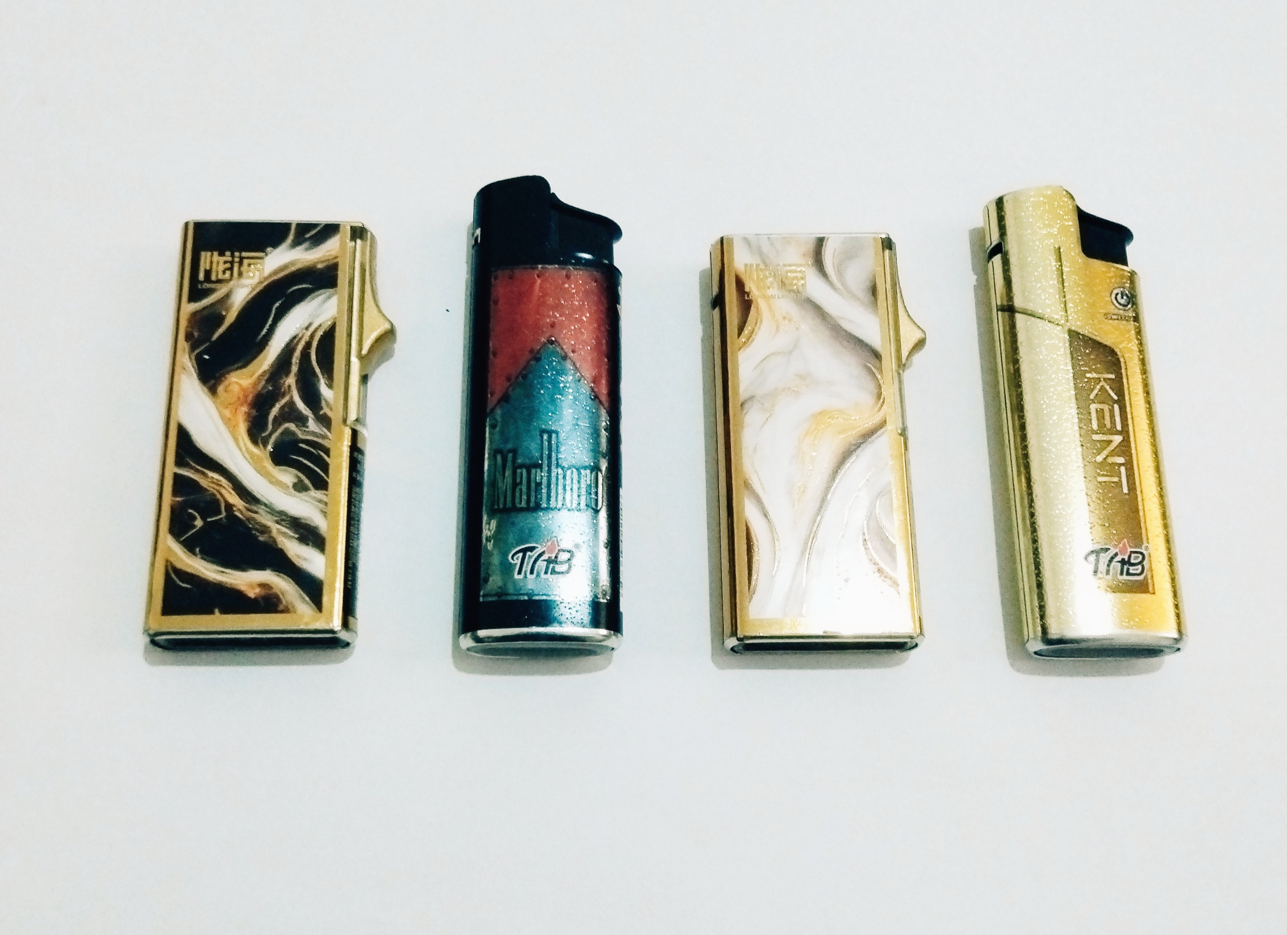 مزایده 4 عدد فندک اتمی فلزی