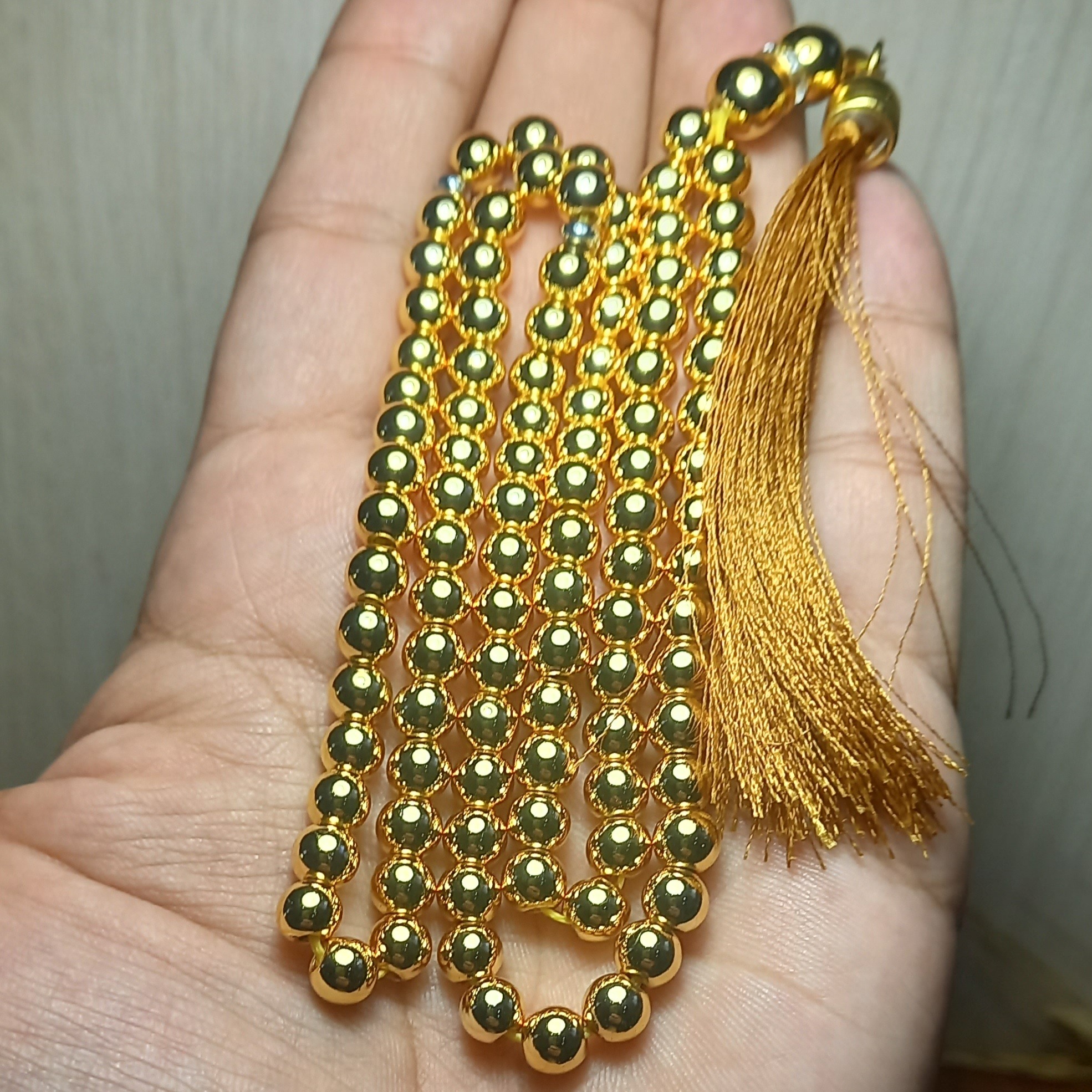 تسبیح حدید طلایی درخشان و بسیار زیبا