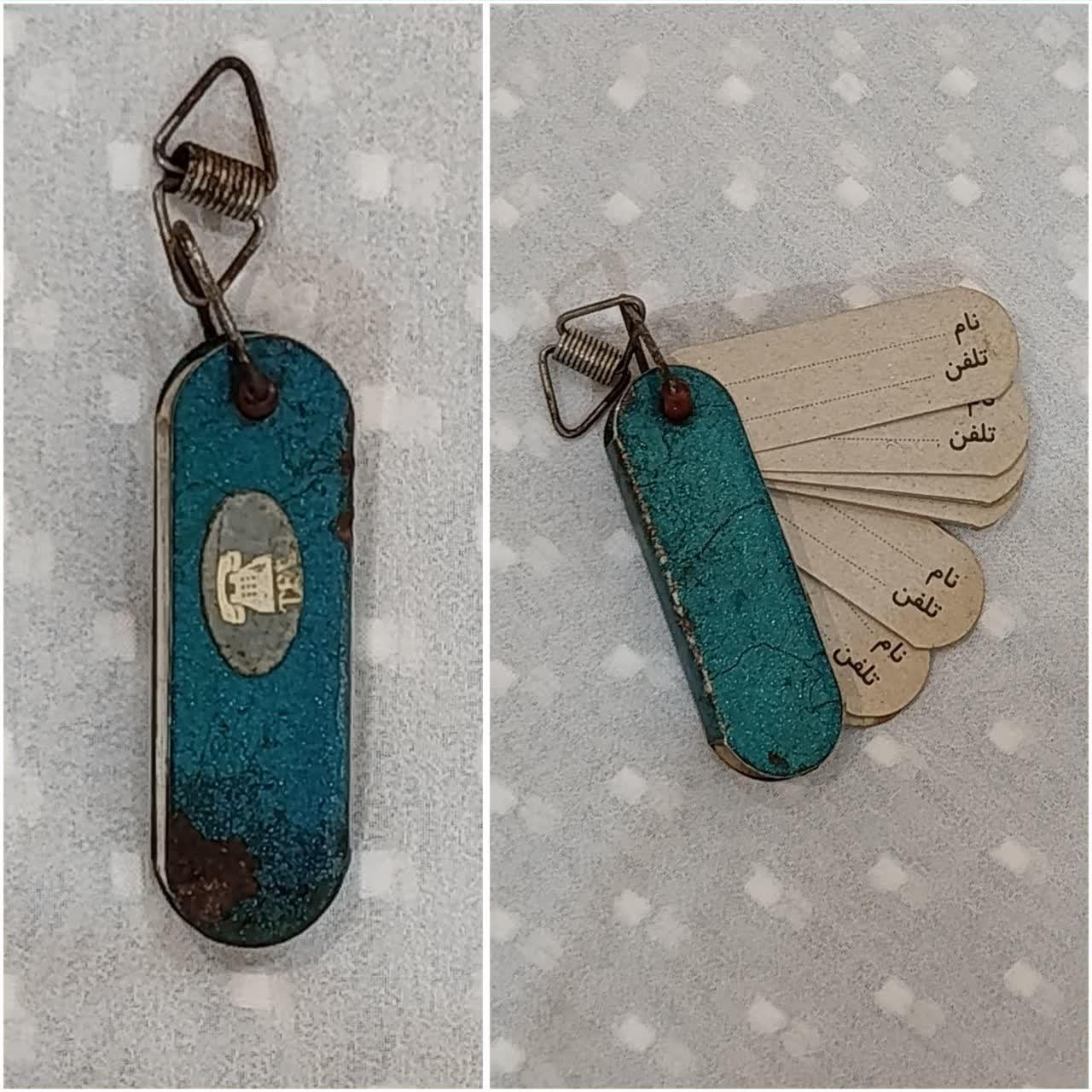 جاکلیدی و اویز دفترچه تلفن توضیحات