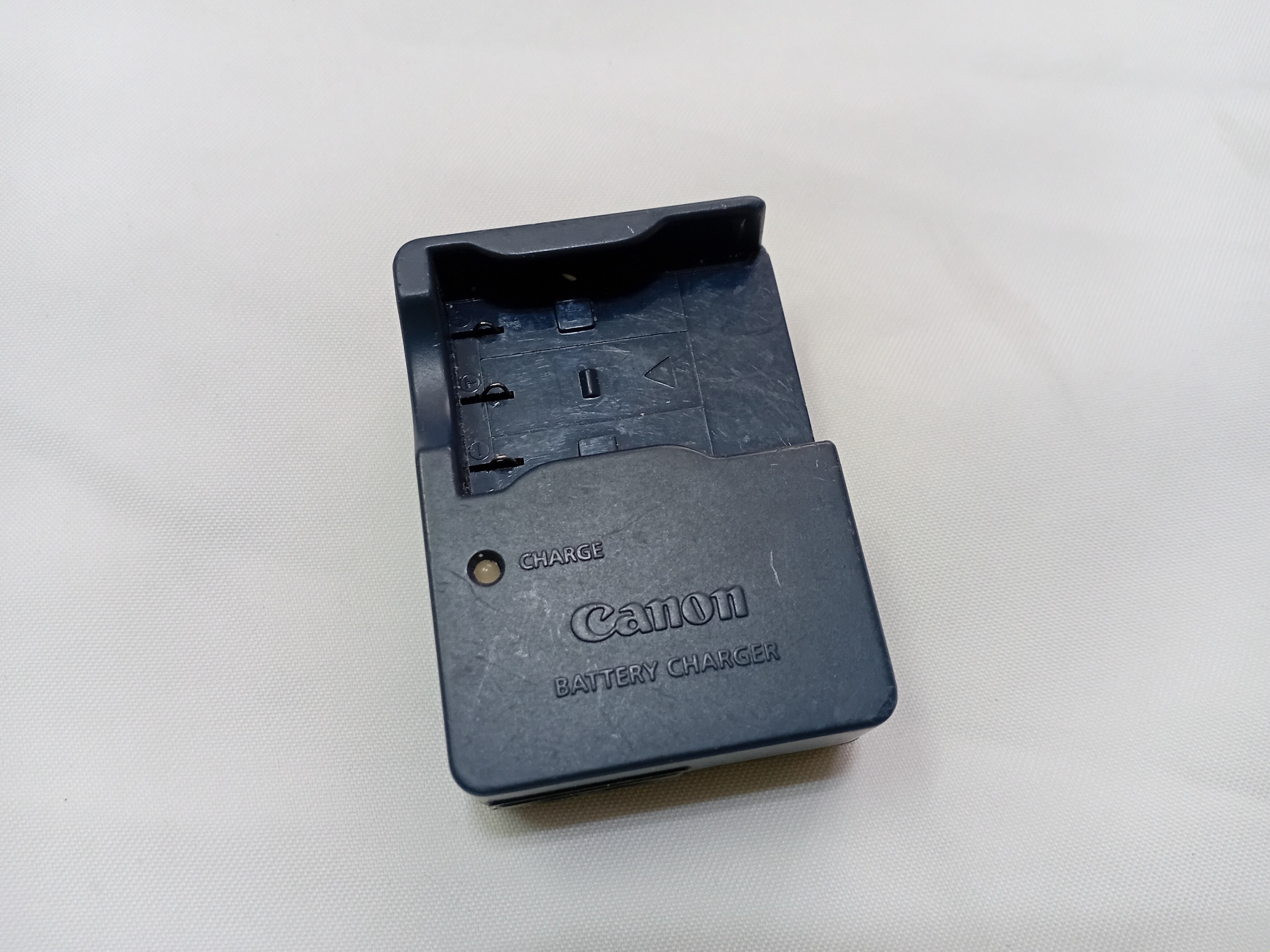 شارژر اصلی باتری دوربین کانن CB-2LUE