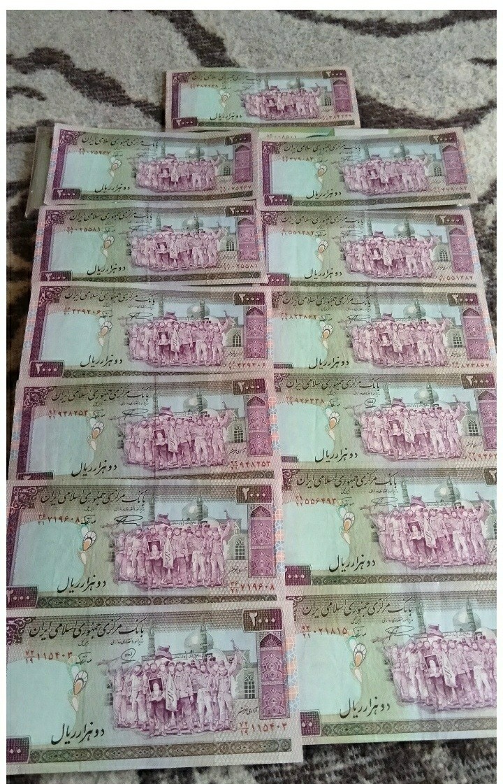 13 اسکناس2000ریال تظاهراتی کمیاب توضی داره